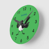 オーストラリアのウィリー・ワグテールの漫画 ラウンド壁時計 (傾斜)