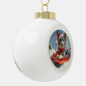 オーストラリアのケッピーそりを雪のクリスマスに セラミックボールオーナメント (左)