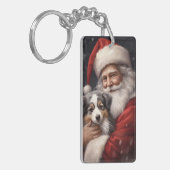 オーストラリアのシェパードとサンタクロースのクリスマス キーホルダー (正面左)