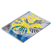 オーストラリアの固有種であるワッテルの黄色い花のアート ノートブック (左側)