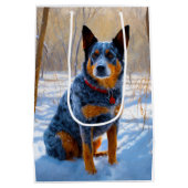 オーストラリアの牛が雪のクリスマスを過ごす ミディアムペーパーバッグ (裏面)