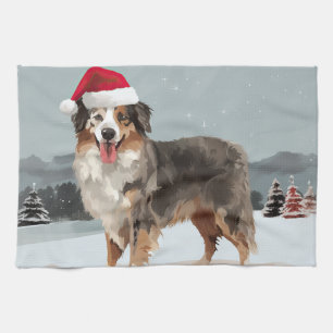 オーストラリアン・シェパードの犬と雪のクリスマス キッチンタオル