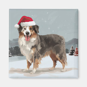 オーストラリアン・シェパードの犬と雪のクリスマス マグネット