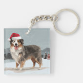 オーストラリアン・シェパードの犬の雪のクリスマス キーホルダー (裏面)