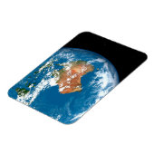 オーストラリア上空に雲を見せる惑星の地球。 マグネット (左側)