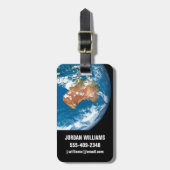 オーストラリア上空に雲を見せる惑星の地球。 ラゲッジタグ (正面縦)