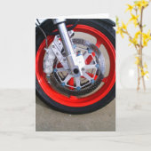 オートバイのオートバイの車輪の赤は写真に縁を付けます カード (黄色い花)