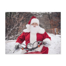 オートバイのポストカードに乗るサンタ条項