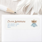 オーブンのシャワーに手で引かれた青いパン男の赤ちゃん ラベル (インサイチュ)