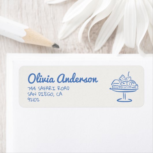 オーブンのシャワーに手で引かれた青いパン男の赤ちゃん ラベル (インサイチュ)