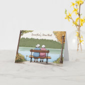 オールドレディースが公園のベンチに座る カード (黄色い花)