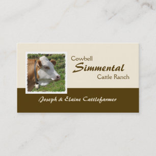カウベルを持つブラウンそして白いSimmental牛 名刺