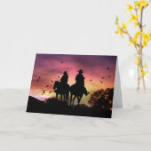 カウボーイおよび女性のカーボーイの乗馬の結婚式のお祝い カード (黄色い花)