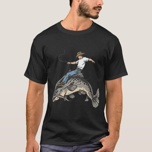 カウボーイに乗られたアメリカナマズ Tシャツ (正面)