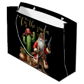 カウボーイサンタシーズンザシーズンデザートカボスピストル ラージペーパーバッグ (裏面アングル)