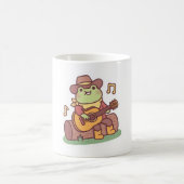 カウボーイハットとギターを持つかわいいカエル コーヒーマグカップ (中央)