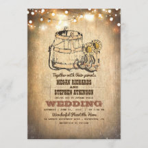 カウボーイ素朴ブーツとストリングライト秋の結婚式