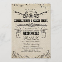 カウボーイ・ブーツのヒマワリの国の素朴な納屋の結婚式