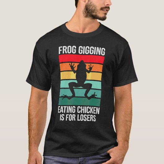カエルを食べるニワトリは負け犬 カエルを食べろ Tシャツ (正面)