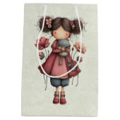 カエル人形を持つ少女 かわいいファンタジー ミディアムペーパーバッグ (裏面)