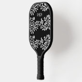 カスタマイズ可能な白黒フローラ旋回ノベルティ ピックルボールラケット (左)