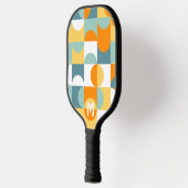 カスタムサニーオレンジティール(緑がかった色)ブルーレトロアートパターン ピックルボールラケット (左)