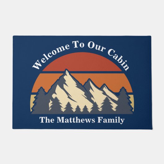 カスタムマウンテンサンセットブルーログキャビンへようこそ ドアマット (正面)