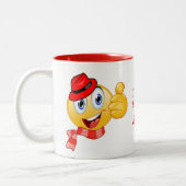 カスタム文字、帽子とスカーフで親指を立てる ツートーンマグカップ (左)