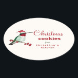 カスタムHummingbird Christmas Cookie 楕円形シール<br><div class="desc">サンタカスタムー帽をかぶったルビーの喉のハミングバードを特徴としたかわいいステッカー。フォントスタイルとフォントサイズクリックは、「さらに」で変カスタマイズ更することができる。</div>