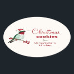 カスタムHummingbird Christmas Cookie 楕円形シール<br><div class="desc">サンタカスタムー帽をかぶったルビーの喉のハミングバードを特徴としたかわいいステッカー。フォントスタイルとフォントサイズクリックは、「さらに」で変カスタマイズ更することができる。</div>