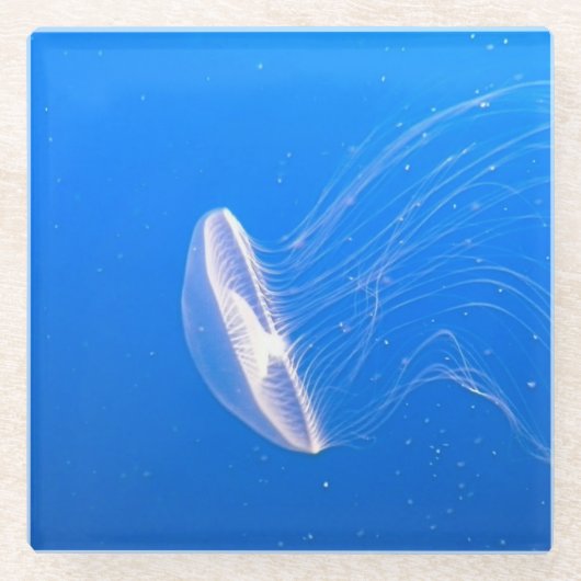 カッコいいクラゲの触手，明るい青の水 ガラスコースター (正面)
