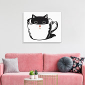 カップに赤い鼻を隠した黒い子猫 キャンバスプリント (インサイチュ (リビング))
