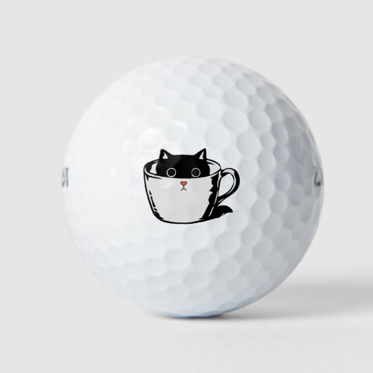 カップに赤い鼻を隠した黒い子猫 ゴルフボール (正面)