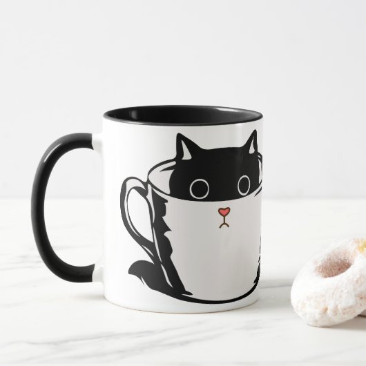 カップに赤い鼻を隠した黒い子猫 マグカップ (ドーナツ)