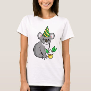 カップケーキのワイシャツを持つかわいい誕生会のコアラ Tシャツ