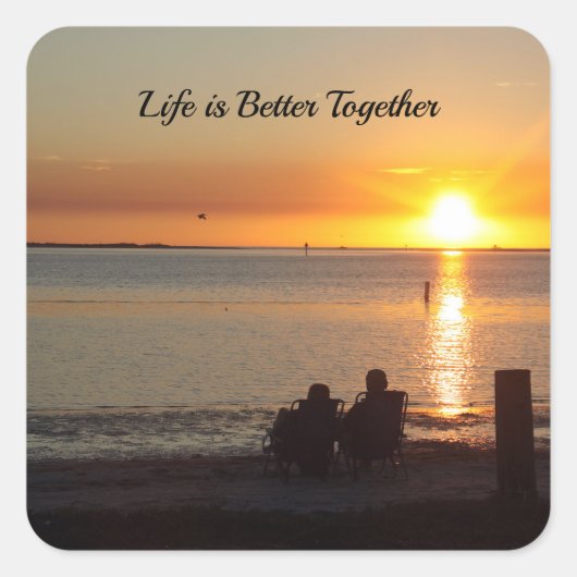 カップルはサンセットシールでビーチに座る スクエアシール (正面)