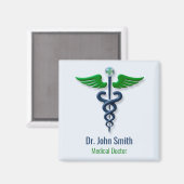 カドゥセウススタイリッシュグリーンメディカルウィングスクロスブルー マグネット (正面/裏面)