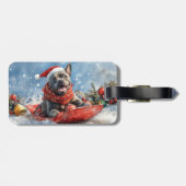 カネコルソが乗ったソリで雪を降らせて クリスマス ラゲッジタグ (裏面横)