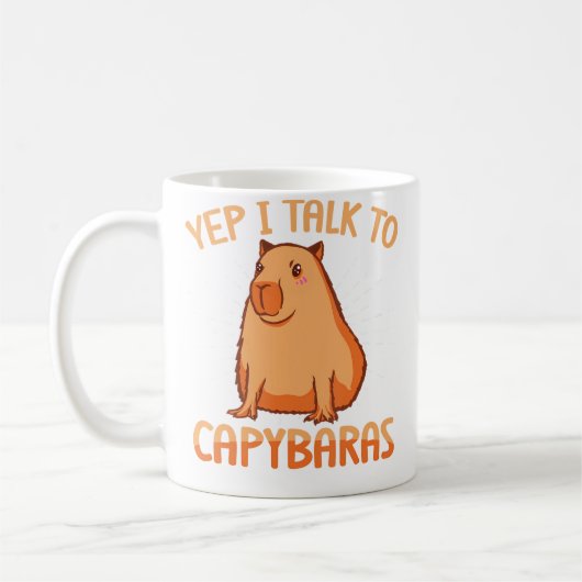 カピバラと話してるよ~面白いカピバラ コーヒーマグカップ (左)