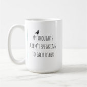 カピバラに座っている二人のブラックバードとマグカップ コーヒーマグカップ (左)