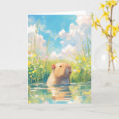カピバラの水遊びベイビー カード (黄色い花)