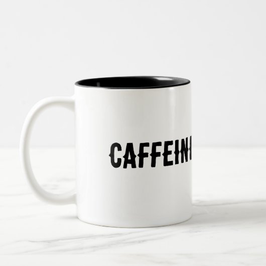 カフェインのロード… ツートーンマグカップ (左)