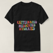 カフェイン入り薬用水和おもしろいことわざナース Tシャツ (デザイン正面)