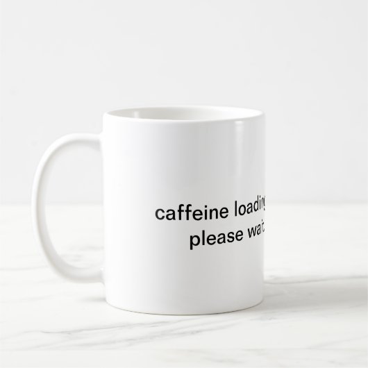 カフェイン読み込み中 お待ちください マグカップ (左)