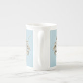 カプチーノのコーヒーハートの葉の渦巻の星のクッキー ボーンチャイナマグカップ (裏面)