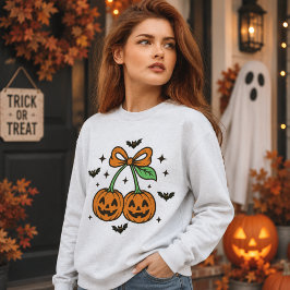 カボチャのチェリーのリボン ハロウィンのコウモリ グラフィック スウェットシャツ
