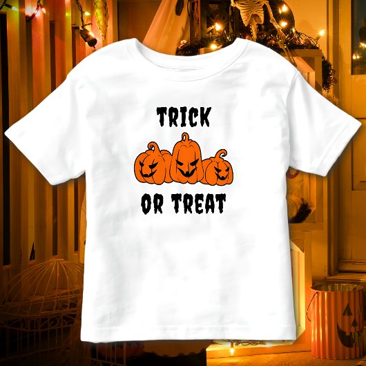 カボチャのハロウィン不気味のトリックまたは治療 トドラーTシャツ