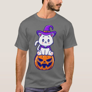 カボチャの漫画に座っているかわいい猫の魔女 Tシャツ