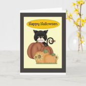 カボチャを持つハロウィンの黒猫 カード (黄色い花)