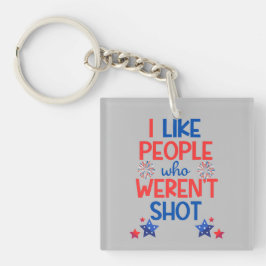 カマラハリス選挙おもしろいアンチ – トランプ赤&青 キーホルダー